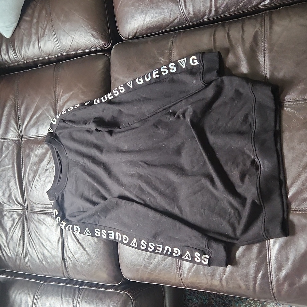 Guess black dress with holographic branding on the sleeves